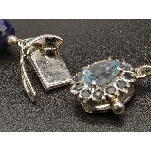 166 - 510ct Faceted 9mm-10mm Blue Sapphire Necklace with Blue topaz and Sapphire clasp set in 925 silver. ... 