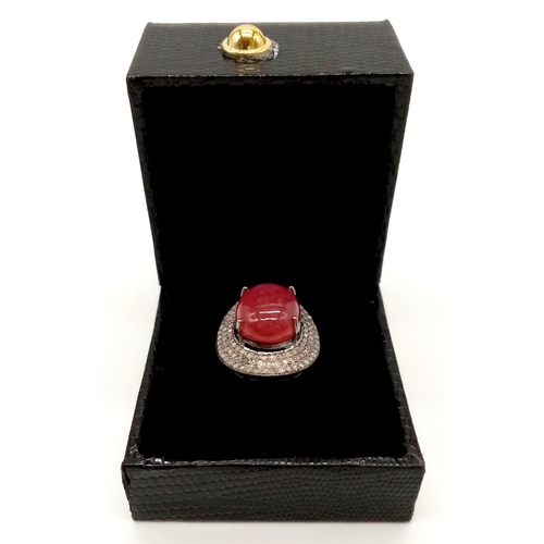 426 - 16ct Cabochon Ruby Gemstone Ring with .85ct of diamonds in a Pave Setting, set in 925 silver. Size P... 