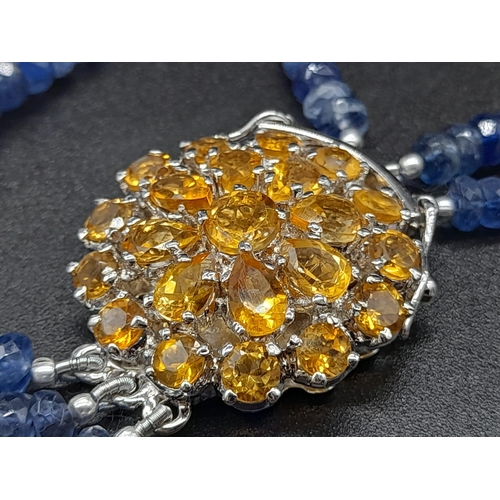 590 - 340ct Three Strand Kyanite Necklace With Citrine Gemstone Clasp in 925 Silver, which comes as a broo... 