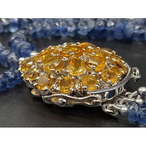 590 - 340ct Three Strand Kyanite Necklace With Citrine Gemstone Clasp in 925 Silver, which comes as a broo... 