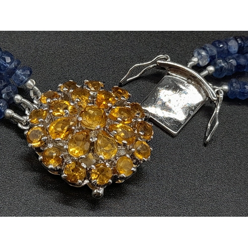 590 - 340ct Three Strand Kyanite Necklace With Citrine Gemstone Clasp in 925 Silver, which comes as a broo... 