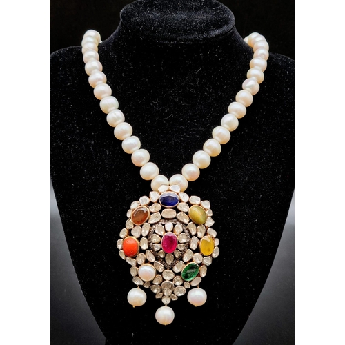 79 - 130 Grams of Rare Polki and Diamond Necklace with a chain of freshwater pearls. The pendant is studd... 