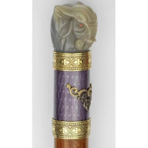 173 - A rare Russian carved agate elephant walking stick
Ruby eyes set in gold 
Top condition 
90cm long 
... 