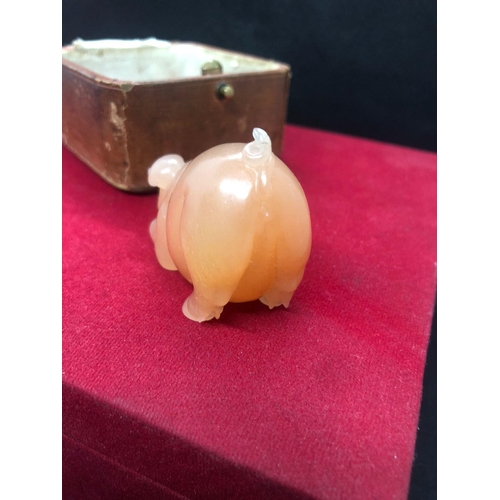 309 - A Russian carved hardstone figure of a pig ,
Original box

Size of pig 
Length 6cm
Width 3cm
Height ... 