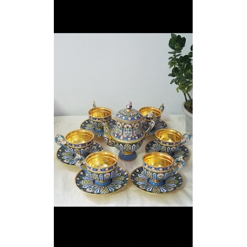 52 - A RUSSIAN SILVER GILT AND CLOISONNÉ ENAMEL TEA SET.

Complete set of 13 pieces .
Superb condition 
E... 