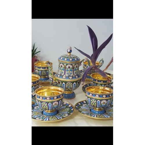 52 - A RUSSIAN SILVER GILT AND CLOISONNÉ ENAMEL TEA SET.

Complete set of 13 pieces .
Superb condition 
E... 