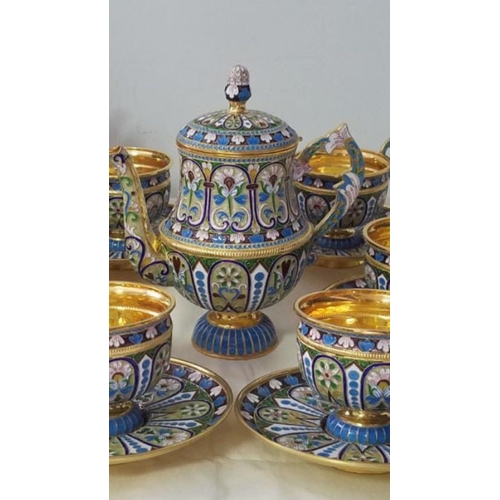 52 - A RUSSIAN SILVER GILT AND CLOISONNÉ ENAMEL TEA SET.

Complete set of 13 pieces .
Superb condition 
E... 