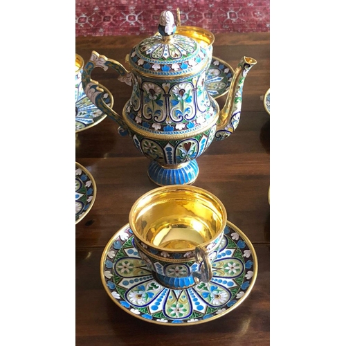 52 - A RUSSIAN SILVER GILT AND CLOISONNÉ ENAMEL TEA SET.

Complete set of 13 pieces .
Superb condition 
E... 