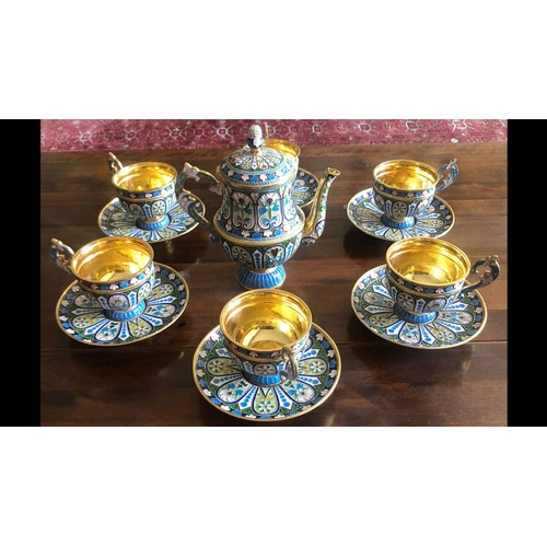 52 - A RUSSIAN SILVER GILT AND CLOISONNÉ ENAMEL TEA SET.

Complete set of 13 pieces .
Superb condition 
E... 