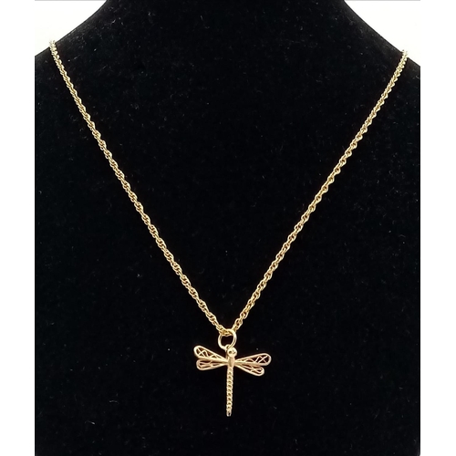 1197 - 9ct gold chain with dragonfly pendant.
Chain - 51cm. Pendant - 2 x 2.1cm. 4.28 grams total weight.