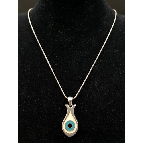 1192 - Solid silver and enamel eye pendant on 16