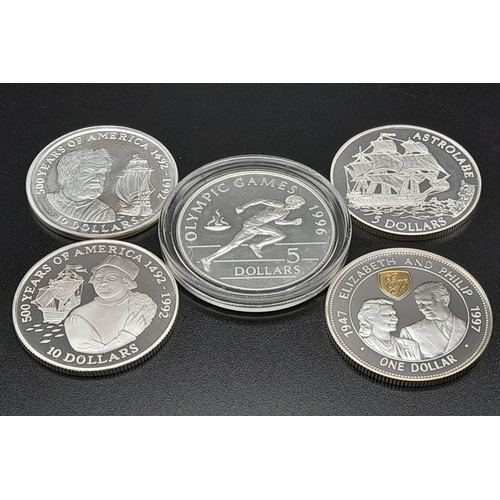 513 - Five Assorted Uncirculated Sterling Silver Coins.