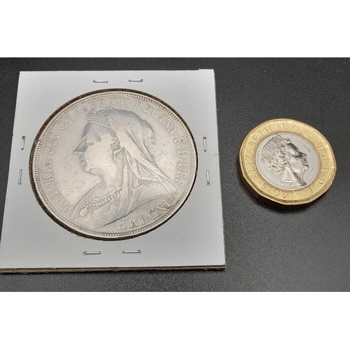 527 - An 1895 Queen Victoria Silver Crown Coin. Please see photos for conditions.