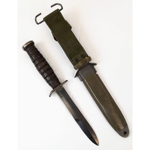 130 - WW2 USA Camillus M3 Trench Fighting Knife. Marked “Camillius M3 on the cross guard. The pommel has t... 