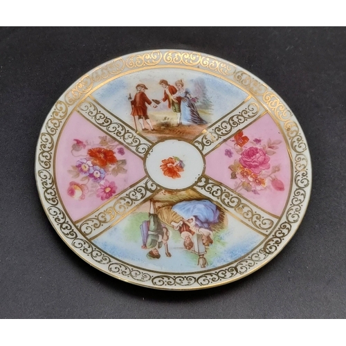 46 - An Antique Meissen Miniature Cup and Saucer. Soft pastel colours. Pastoral scenes and gilded decorat... 