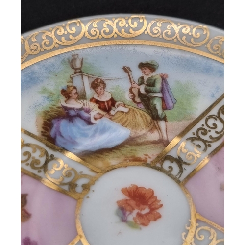 46 - An Antique Meissen Miniature Cup and Saucer. Soft pastel colours. Pastoral scenes and gilded decorat... 