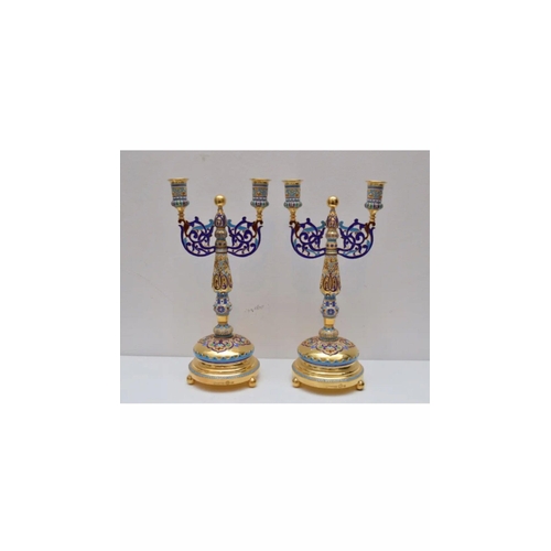 491 - STUNNING 20thC RUSSIAN PAIR OF SOLID SILVER ENAMEL CANDELABRAS.


Height of each 25.4cm

Width from ... 