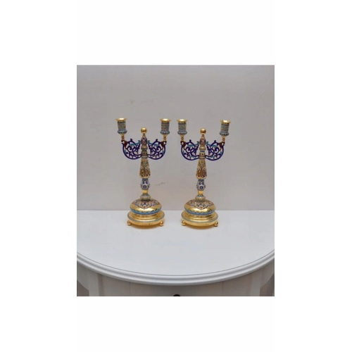 491 - STUNNING 20thC RUSSIAN PAIR OF SOLID SILVER ENAMEL CANDELABRAS.


Height of each 25.4cm

Width from ... 