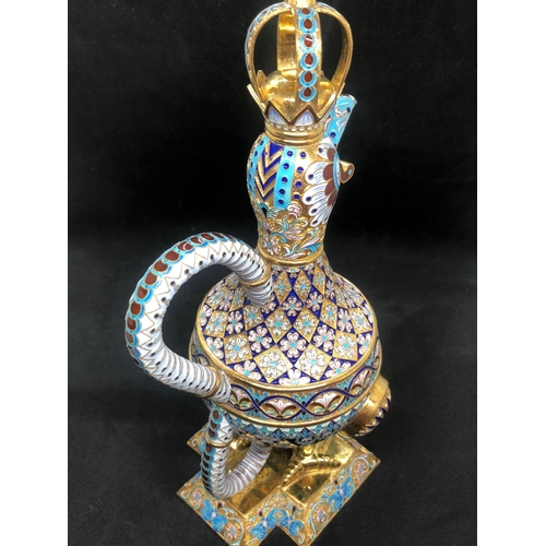 8 - A expectational large Russian silver enamel decanter 
Weight 805.5 grams 
Height 33cm 
Length base 1... 