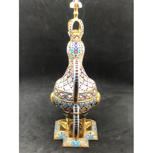 8 - A expectational large Russian silver enamel decanter 
Weight 805.5 grams 
Height 33cm 
Length base 1... 