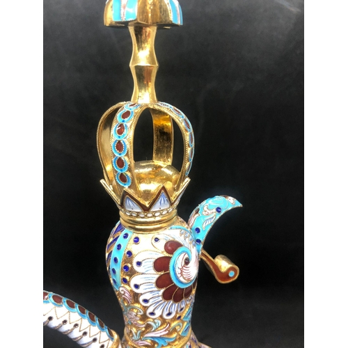 8 - A expectational large Russian silver enamel decanter 
Weight 805.5 grams 
Height 33cm 
Length base 1... 