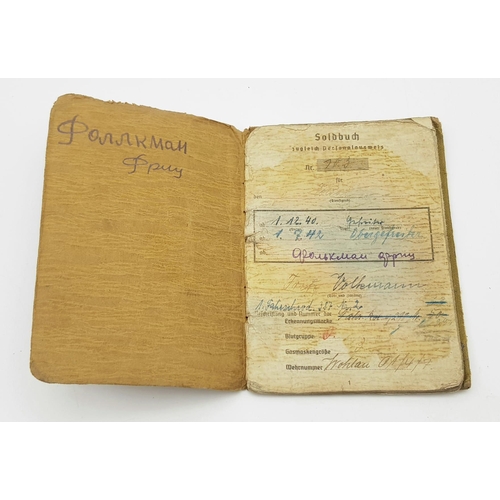 299 - WW2 German Sold Buch (Pay Book) for a P.O.W. in Russia with Eastern Front Medal Included.