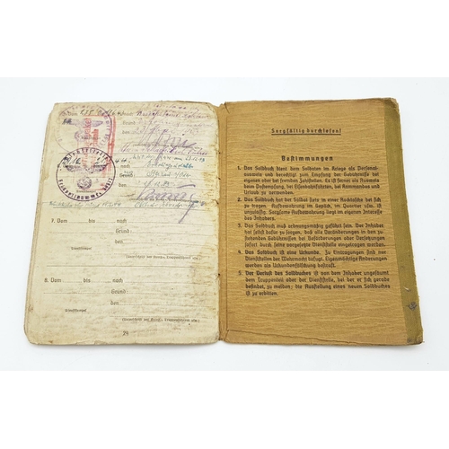 299 - WW2 German Sold Buch (Pay Book) for a P.O.W. in Russia with Eastern Front Medal Included.