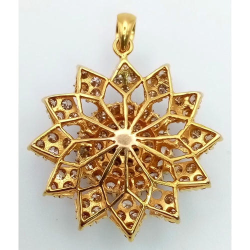 158 - A Sensational Vintage 18K Yellow Gold Diamond Floral Pendant. 40 bright round-cut diamonds decorate ... 