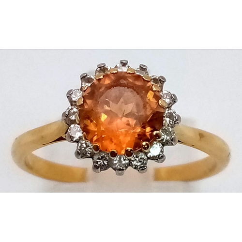 185 - An 18K Yellow Gold Orange Ceylon Sapphire and Diamond Ring. Central richly-coloured sapphire surroun... 