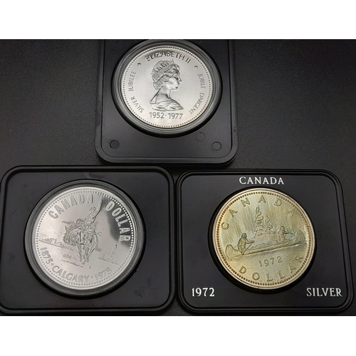 192 - Three Uncirculated Canadian Silver Dollars in Original Presentation Cases.