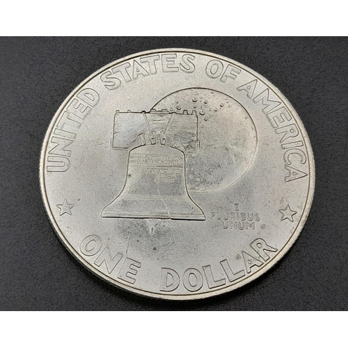 310 - Four American Silver Coins: Two one dollars and two half dollars. Please see photos for conditions.