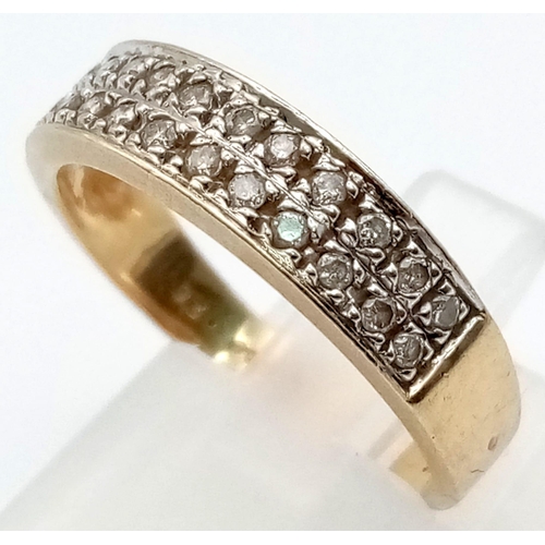 501 - A 9K Yellow Gold Diamond Double-Row Half Eternity Ring. Size N. 3g total weight. 24 round-cut diamon... 