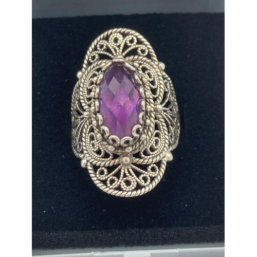 141 - Stunning vintage  SILVER and AMETHYST RING , having large faceted AMETHYST gemstone set to top with ... 