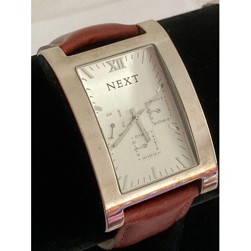 203 - Pair of popular High Street brand wristwatches, having quality leather strap and stainless steel bra... 