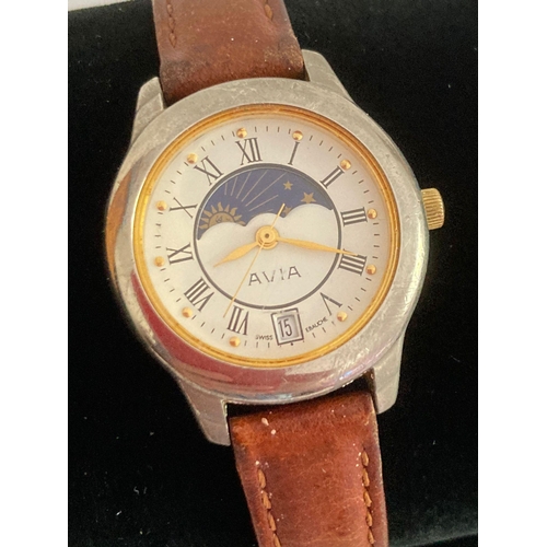 315 - Vintage Ladies AVIA MOONPHASE wristwatch, Quartz movement with Roman numerals and golden hands. Tan ... 