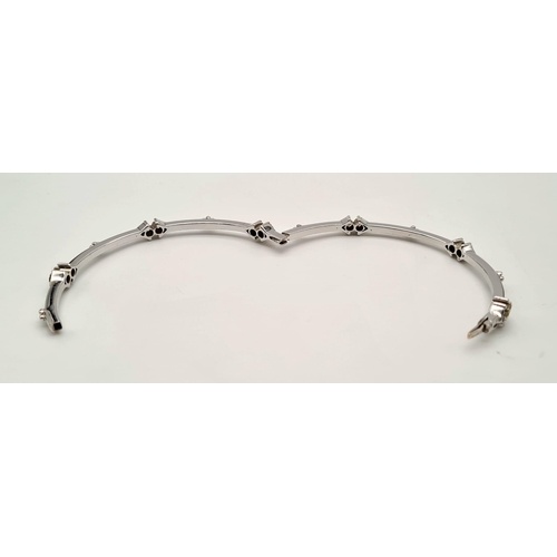 51 - 18K WHITE GOLD DIAMOND SET BANGLE 0.60CT 16.9G