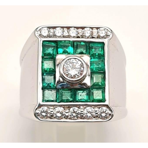 71 - A Heavy 18k White Gold Emerald and Diamond Dress Ring. Central round-cut brilliant diamonds surround... 