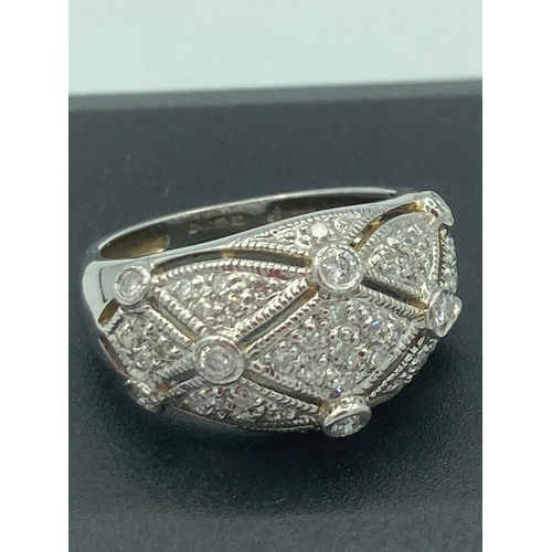 84 - Fabulous 9 carat WHITE GOLD RING absolutely encrusted in DIAMONDS. Full UK hallmark.
4.0 grams Size ... 