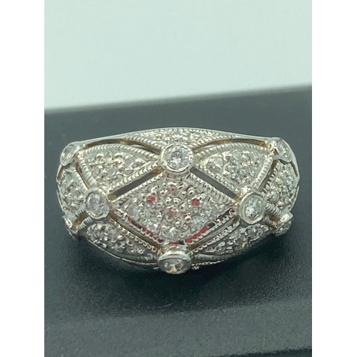 84 - Fabulous 9 carat WHITE GOLD RING absolutely encrusted in DIAMONDS. Full UK hallmark.
4.0 grams Size ... 