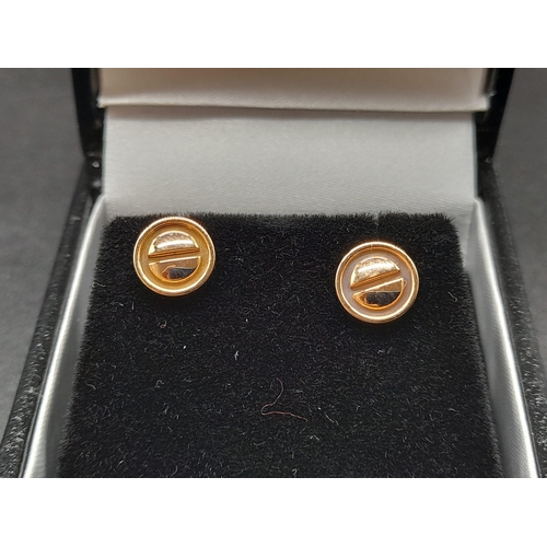 16 - A Pair of 18K Rose Gold Cartier Love Stud Earrings.