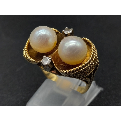 45 - An 18K Yellow Gold Pearl and Diamond Ring. Two round brilliant cut natural diamonds and two near-rou... 