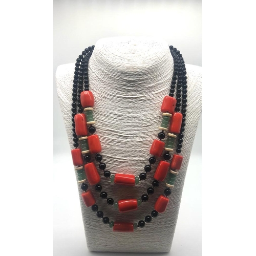 204 - A Unique Fancy White Coral Rondelle and Orange Coral Barrel-Bead Necklace - interspersed with black ... 