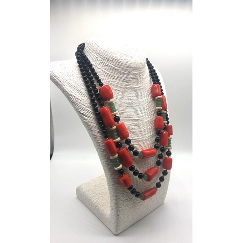 204 - A Unique Fancy White Coral Rondelle and Orange Coral Barrel-Bead Necklace - interspersed with black ... 