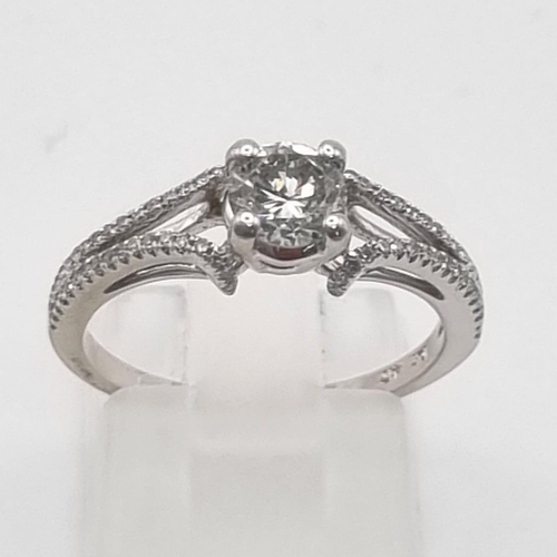 250 - 10K WHITE GOLD DIAMOND SOLITAIRE WITH DIAMOND SET SPLIT SHOULDERS 0.50CT CENTRE STONE 2.2G SIZE M