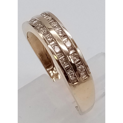 286 - A 9K Yellow Gold Diamond Double-Row Half-Eternity Ring. Alternating round-cut and baguette diamonds.... 