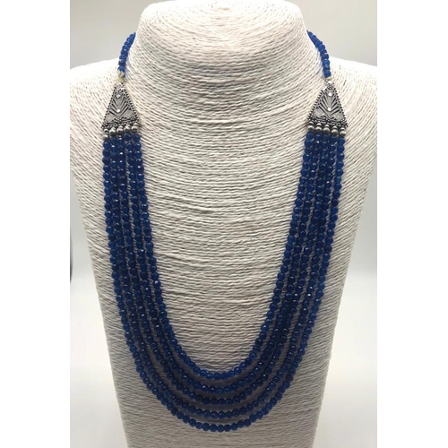 399 - A Five-Row Blue Onyx Beaded Necklace. 3mm beads. Double triangle link receptors. Lobster clasp. 52 -... 