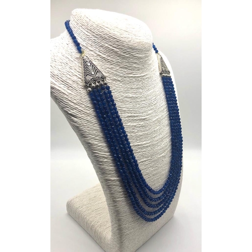 399 - A Five-Row Blue Onyx Beaded Necklace. 3mm beads. Double triangle link receptors. Lobster clasp. 52 -... 