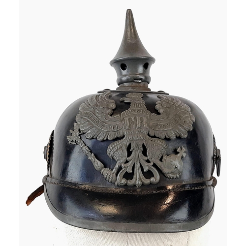 69 - WW1 Prussian M1915 Infantry Pickelhaube. Unit stamped. With liner & cockades.