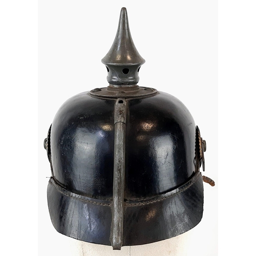 69 - WW1 Prussian M1915 Infantry Pickelhaube. Unit stamped. With liner & cockades.