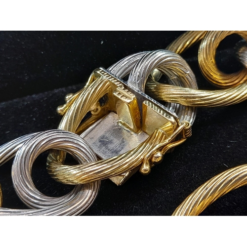 2 - A Very Unique 18K Yellow and White Gold W.G.I. Certified Bracelet. Barbed-wire effect links. 100.88g... 